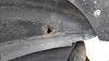 rust hole in rear passenger door into wheel well-20140312_124309.jpg